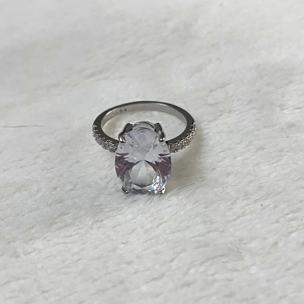 The Standing Ovation 5 ct Oval Cut White Sapphire 925 Silver ring size 8